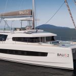 Front view of the Bali 5.2 sailing catamaran at anchor