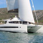 Bali 5.4 sailing with a man at the helm