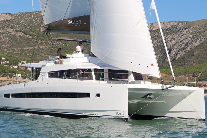 Bali 5.4 sailing with a man at the helm