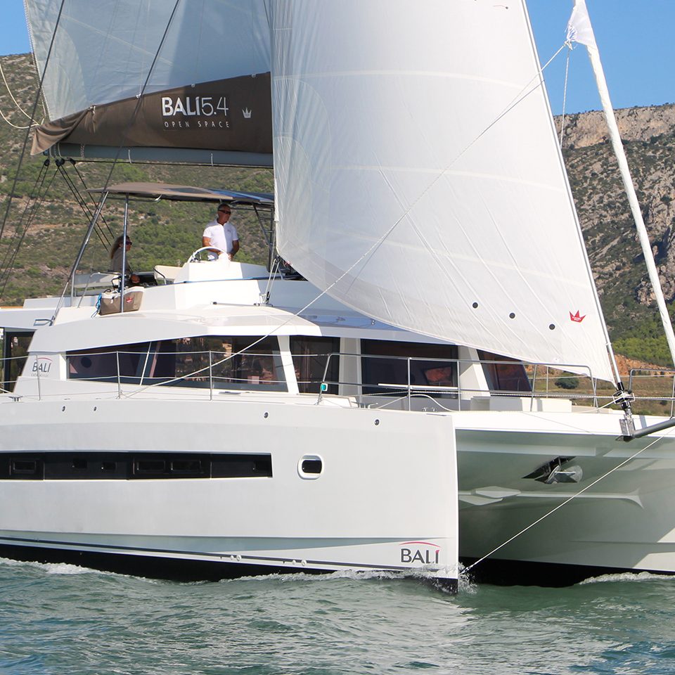 Bali 5.4 sailing with a man at the helm