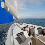 Beneteau Oceanis 40.1 sailing with a man at the helm