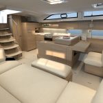Interior of the Oceanis 52 with the sofa and the fully equiped galley
