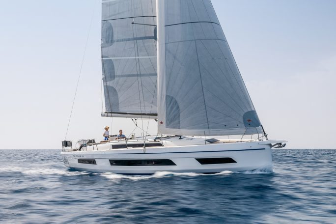 Dufour 41 sailing with a woman at the helm