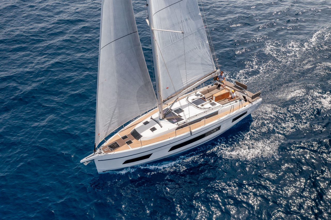 Aerial view of the Dufour 41 sailing with a man at the helm
