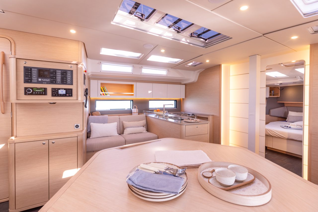 Through view of the Dufour 48 interior with the saloon and the galley