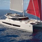 Fountaine Pajot NEW 44 sailing with a man at the helm