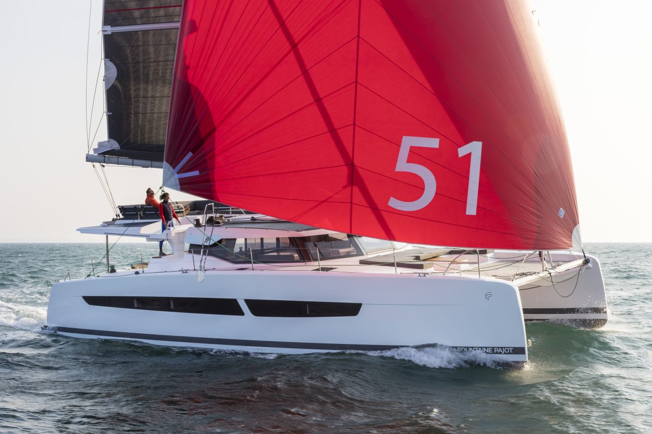 Fountaine Pajot Aura 51 sailing with a man at the helm