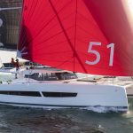 Fountaine Pajot Aura 51 sailing with a man at the helm