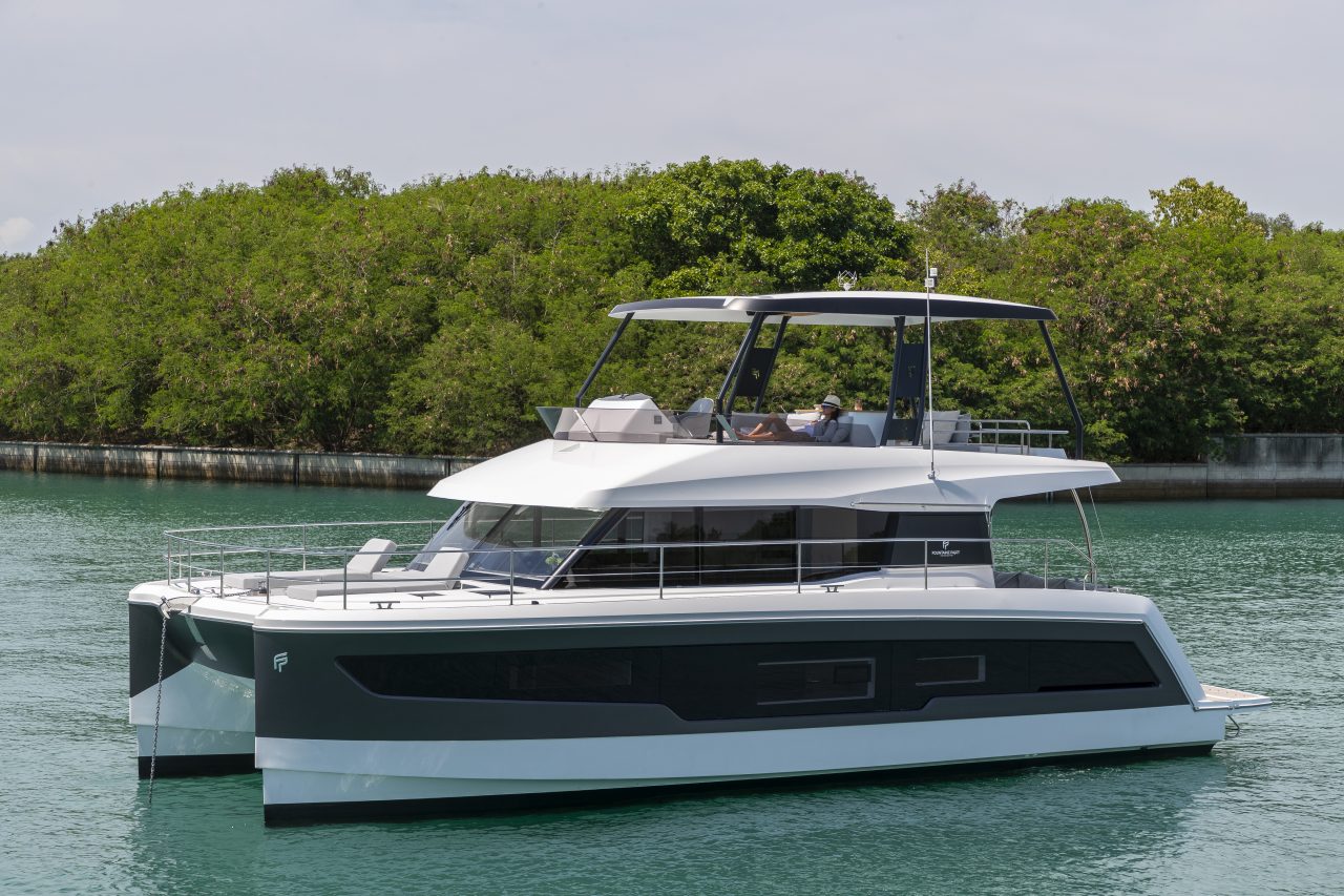 Fountaine Pajot MY5 at anchor with women enjoying the foredeck