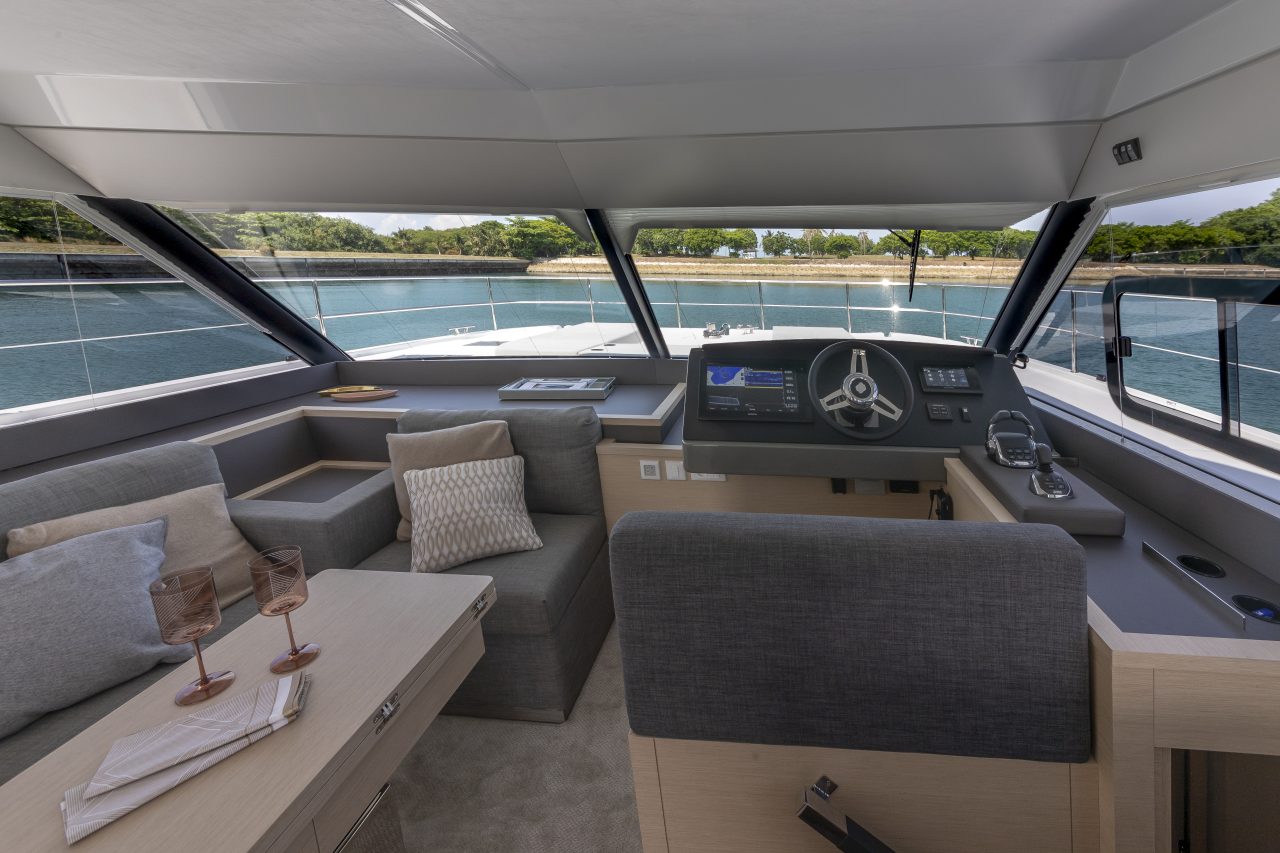 Through view of the amazing salon of the Fountaine Pajot MY5 with a 360 degrees sea view