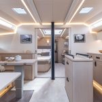 Through view of the Jeanneau 55 interior with the salon, kitchen and cabins