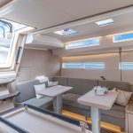 Spacious and luminous salon of the Jeanneau 55 sailing monohull