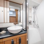 intimate bathroom aboard the Jeanneau Yacht 65 sailing monohull