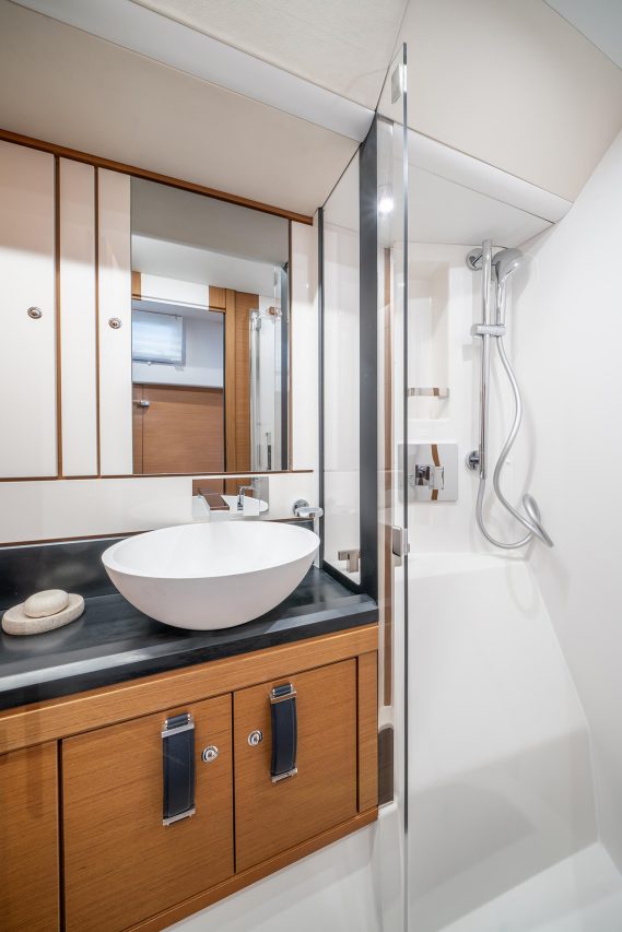 intimate bathroom aboard the Jeanneau Yacht 65 sailing monohull