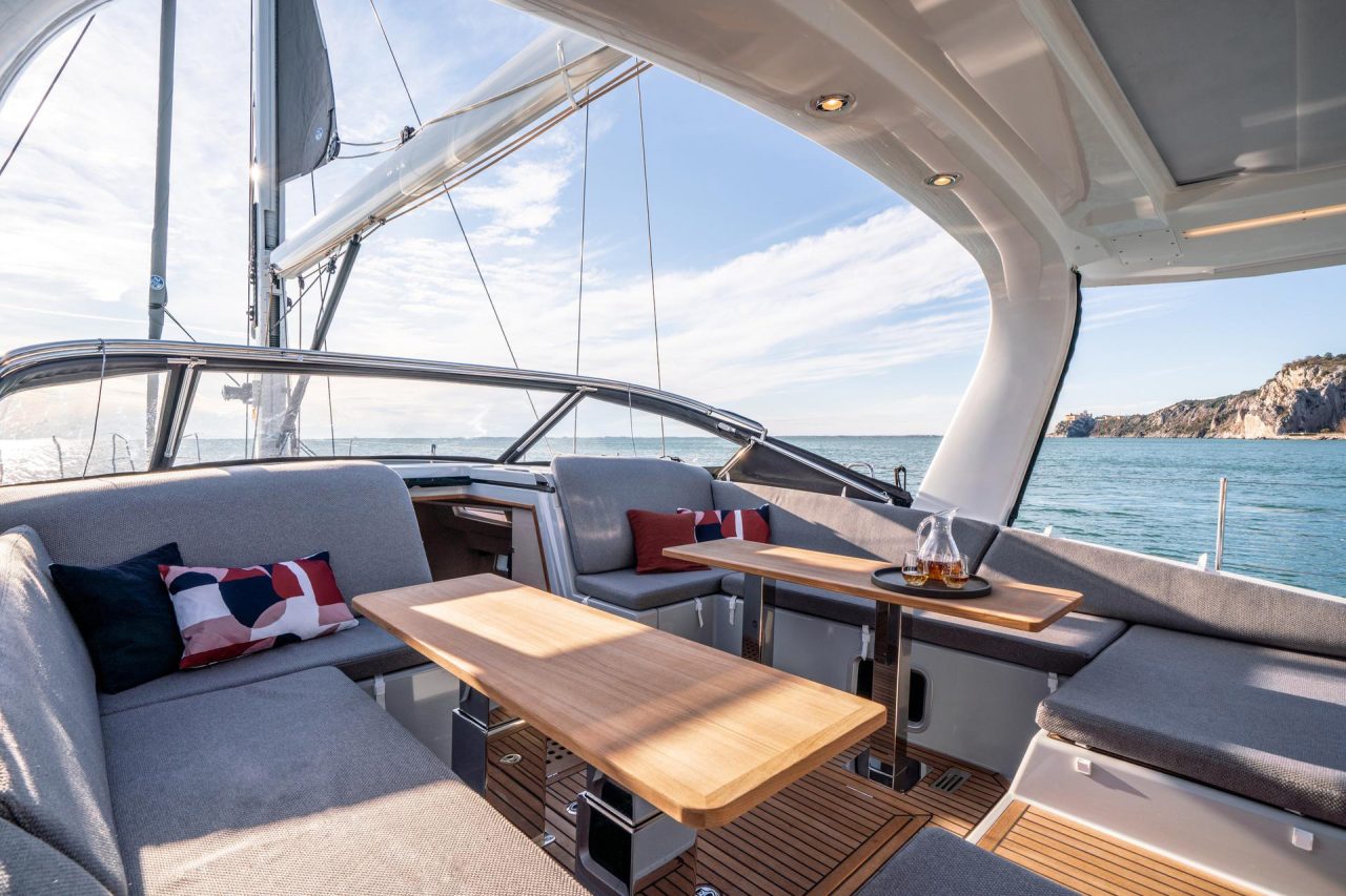 Through view of the comfortable cockpit of the Jeanneau Yacht 65 sailing monohull