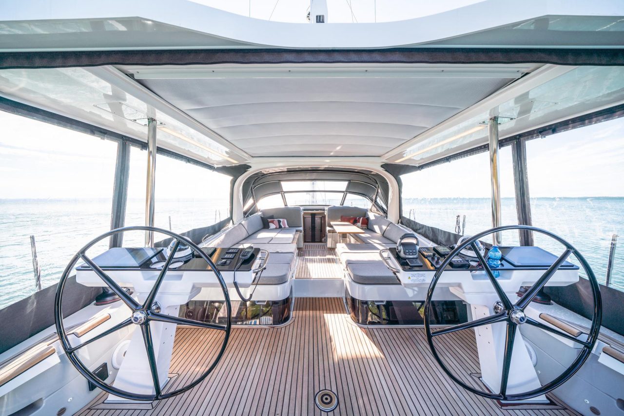 Through view of the comfortable cockpit of the Jeanneau Yacht 65 sailing monohull