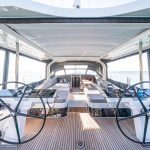 Through view of the comfortable cockpit of the Jeanneau Yacht 65 sailing monohull