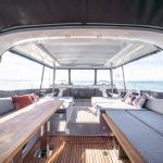 Through view of the comfortable cockpit of the Jeanneau Yacht 65 sailing monohull