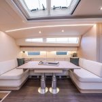 Comfortable and spacious salon of the Jeanneau Yacht 65 sailing monohull