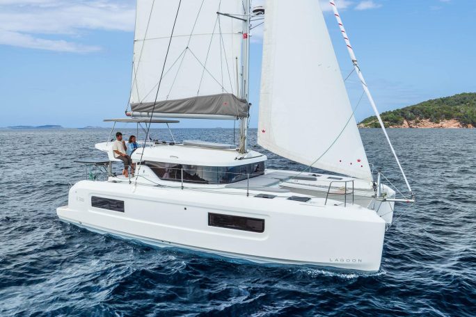 Lagoone 38 sailing with a couple at the helm