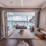 Interior of the Lagoon 38 sailing catamaran with the salon and kitchen