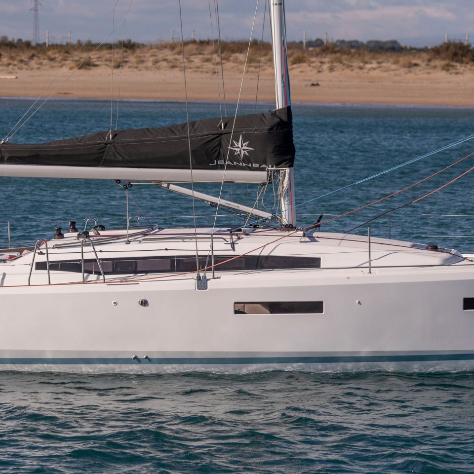 Side view of the Sun Odyssey 380 sailing monohull at anchor