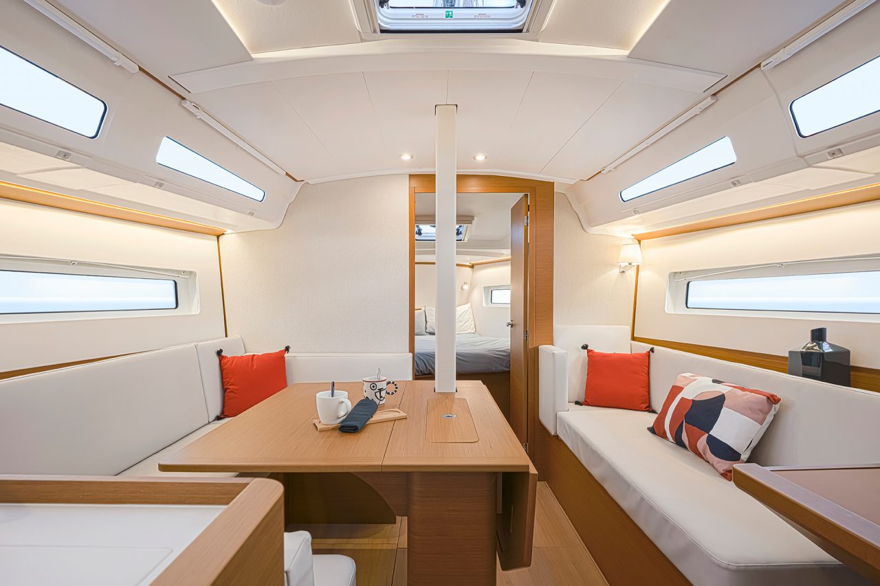 Through view of the Sun Odssey 380 interior with the salon and a cabin
