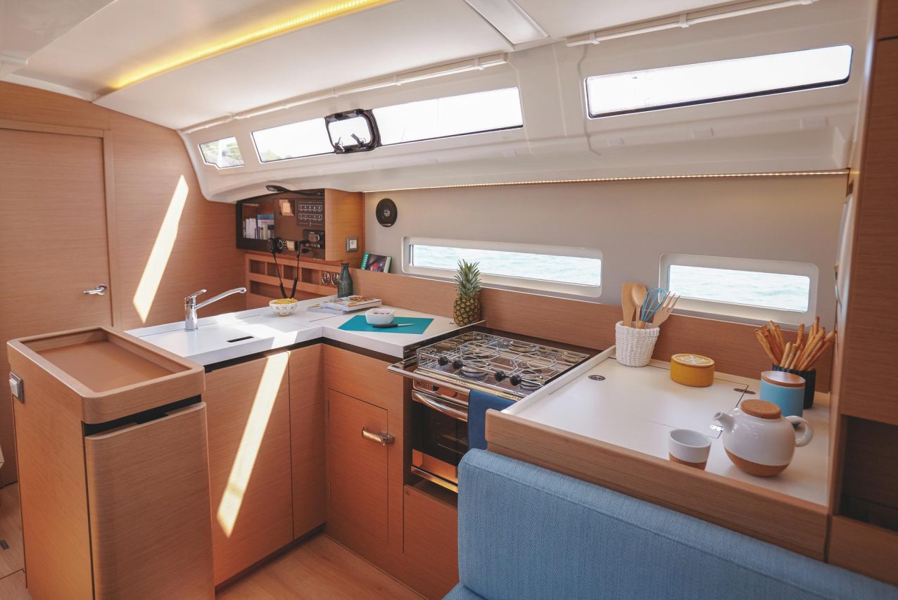 Interior picture of the fully equiped kitchen of the Jeanneau Sun Odyssey 410 sailing monohull