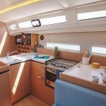 Interior picture of the fully equiped kitchen of the Jeanneau Sun Odyssey 410 sailing monohull