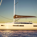 Jeanneau Sun Odyssey 415 sailing at sunset
