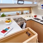 Interior picture of the fully equiped kitchen of the Jeanneau Sun Odyssey 440 sailing monohull
