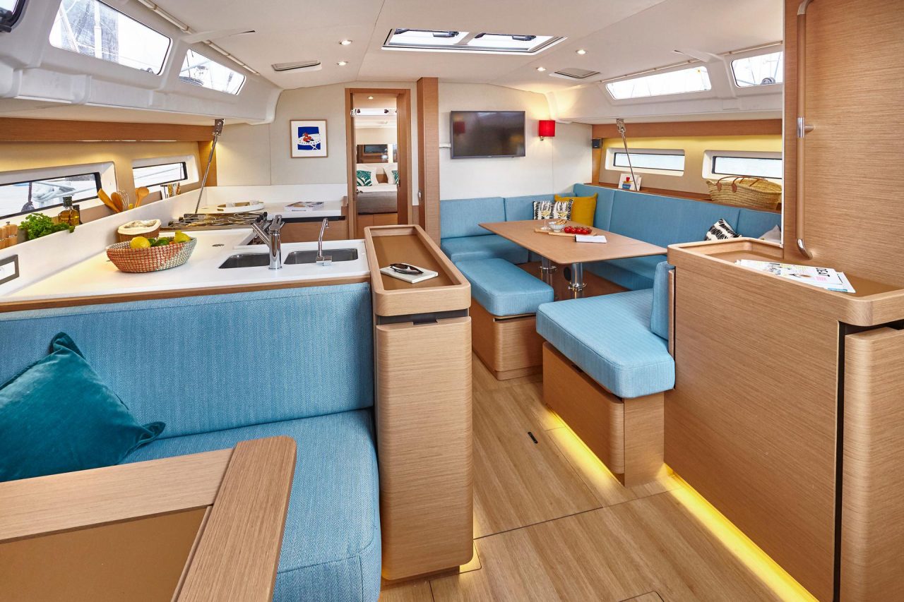 Through view of the Jeanneau Sun Odssey 490 interior with the salon, kitchen and a cabin