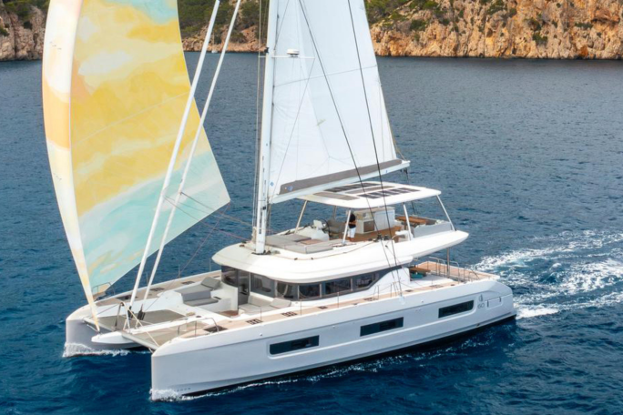 A Lagoon 60 sailing catamaran underway