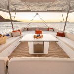 Bali 5.8 Flybridge table and lounge area